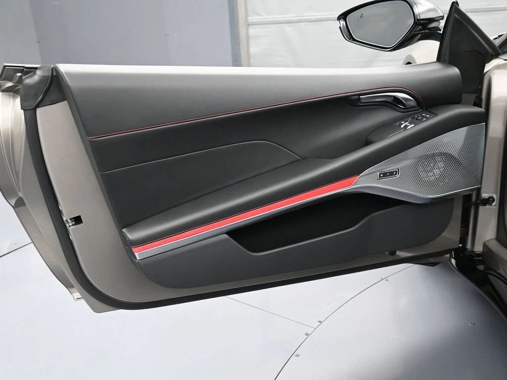 2026 Lotus Emira Turbo SE interior, door panel, Black Leather with Red Accents
