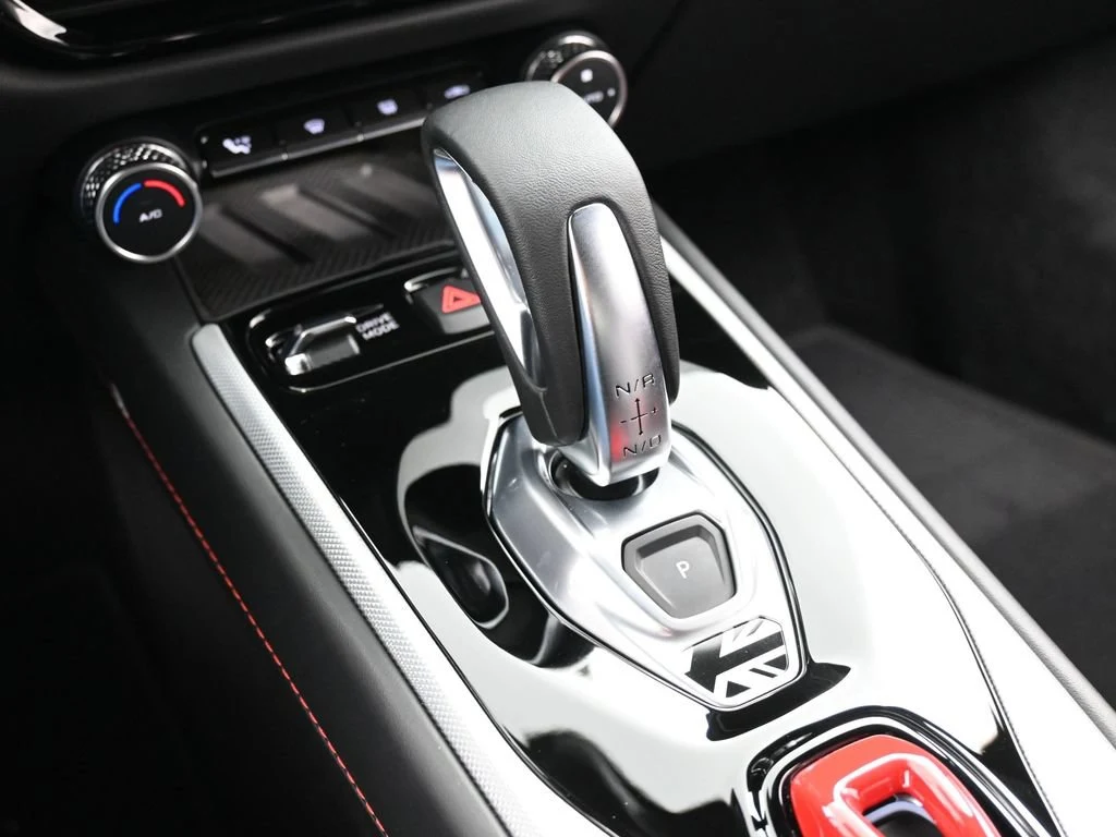 2026 Lotus Emira Turbo SE interior, center console, Black Leather with Red Accents