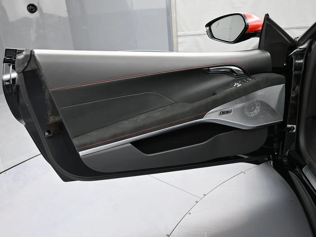 2026 Lotus Emira V6 SE Racing Line interior, door panel, Black Alcantara with Red Stitch