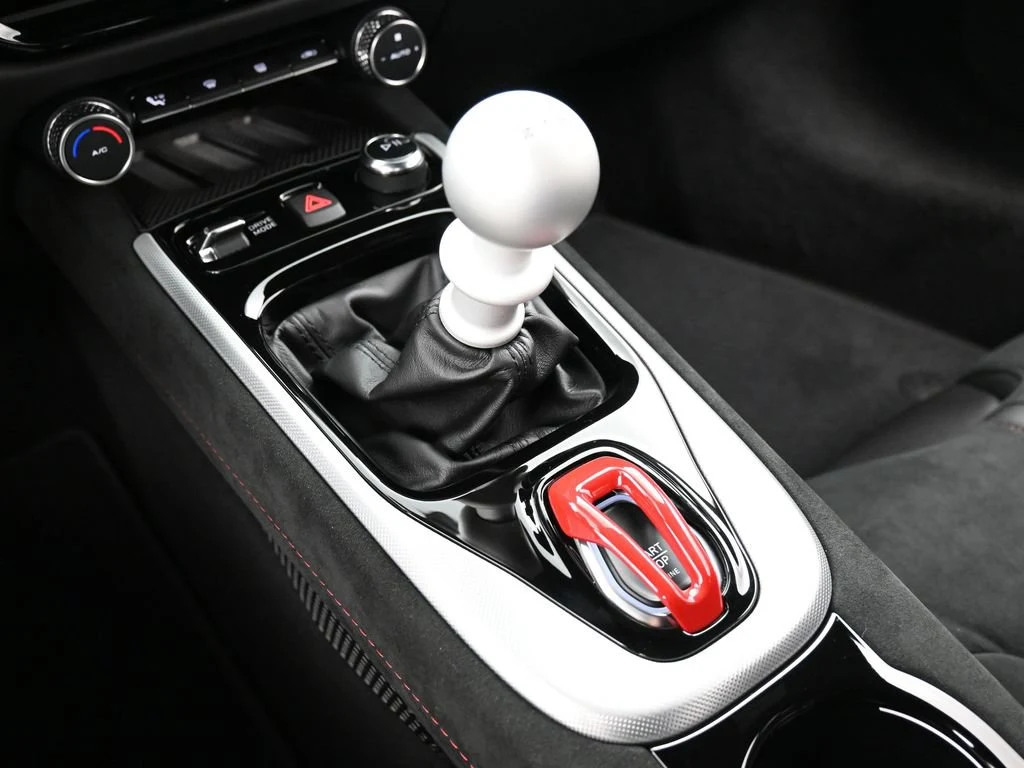2026 Lotus Emira V6 SE Racing Line interior, center console, Black Alcantara with Red Stitch