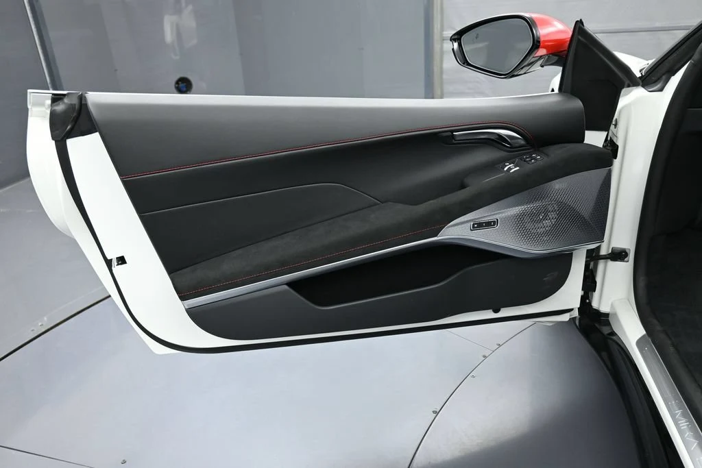 2026 Lotus Emira V6 SE Racing Line interior, door panel, Black with Red Accents