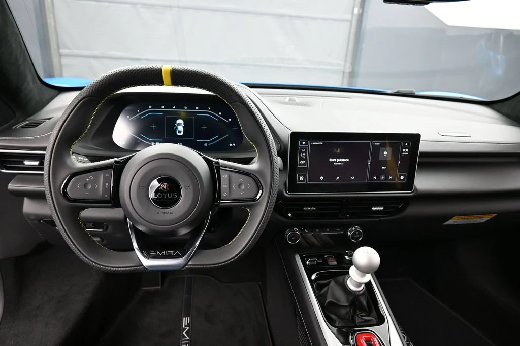 2026 Lotus Emira V6 SE interior, dashboard, Black with Yellow Accents