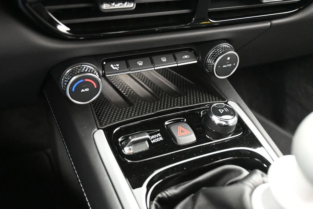 2026 Lotus Emira V6 SE interior, center console, Black with Yellow Accents