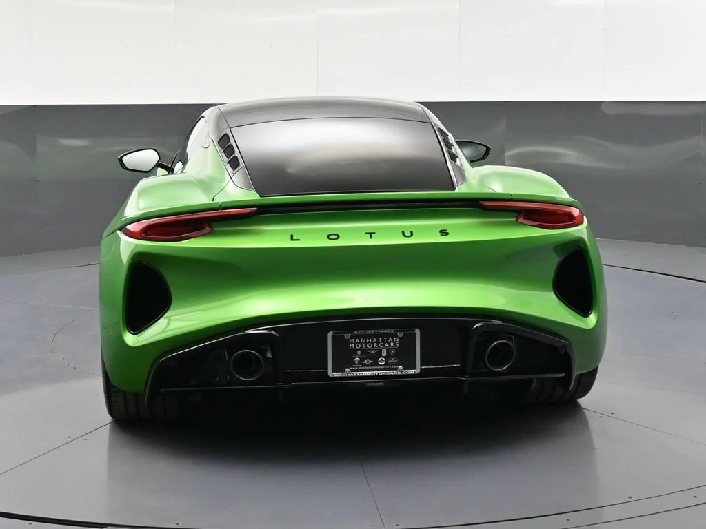 2026 Lotus Emira V6 SE, rear three-quarter view, Green