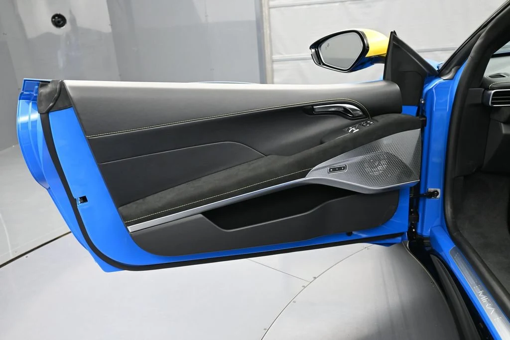 2026 Lotus Emira V6 interior, door panel, Black with Yellow Stitch