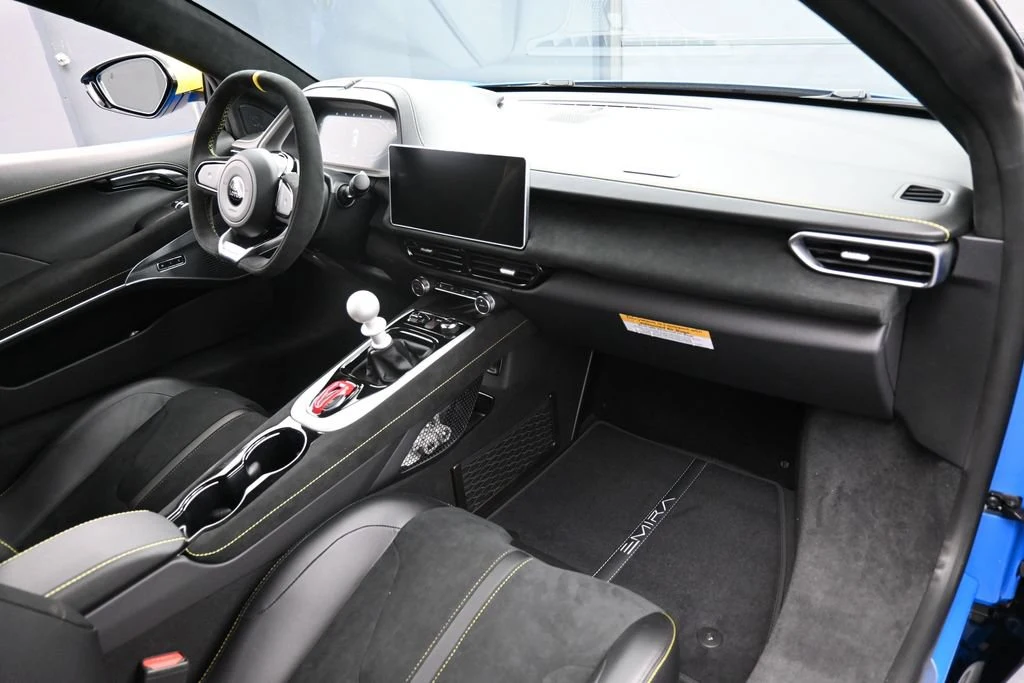2026 Lotus Emira V6 interior, dashboard, Black with Yellow Stitch