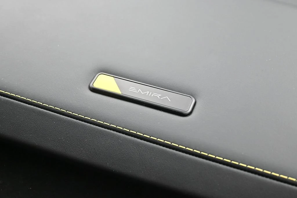 2026 Lotus Emira V6 interior, door sill, Black with Yellow Stitch
