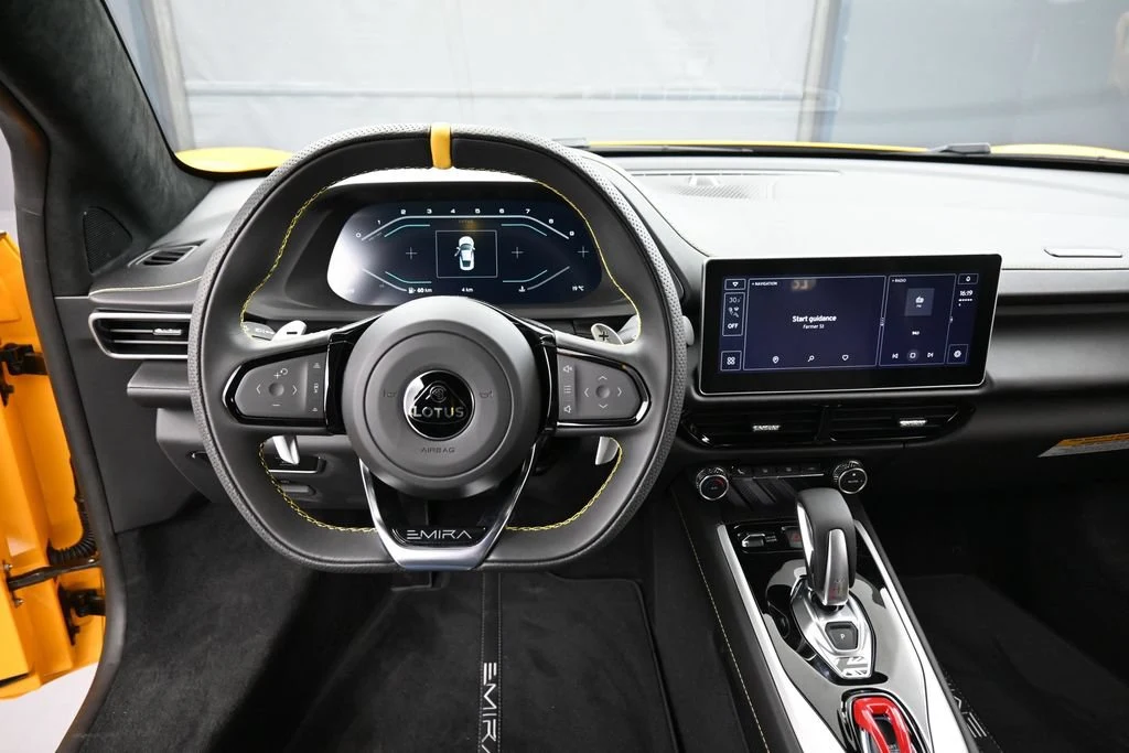 2026 Lotus Emira Turbo SE interior, dashboard, Black with Yellow Stitch