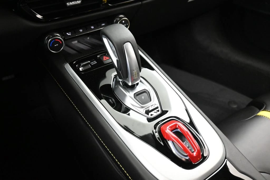 2026 Lotus Emira Turbo SE interior, center console, Black with Yellow Stitch