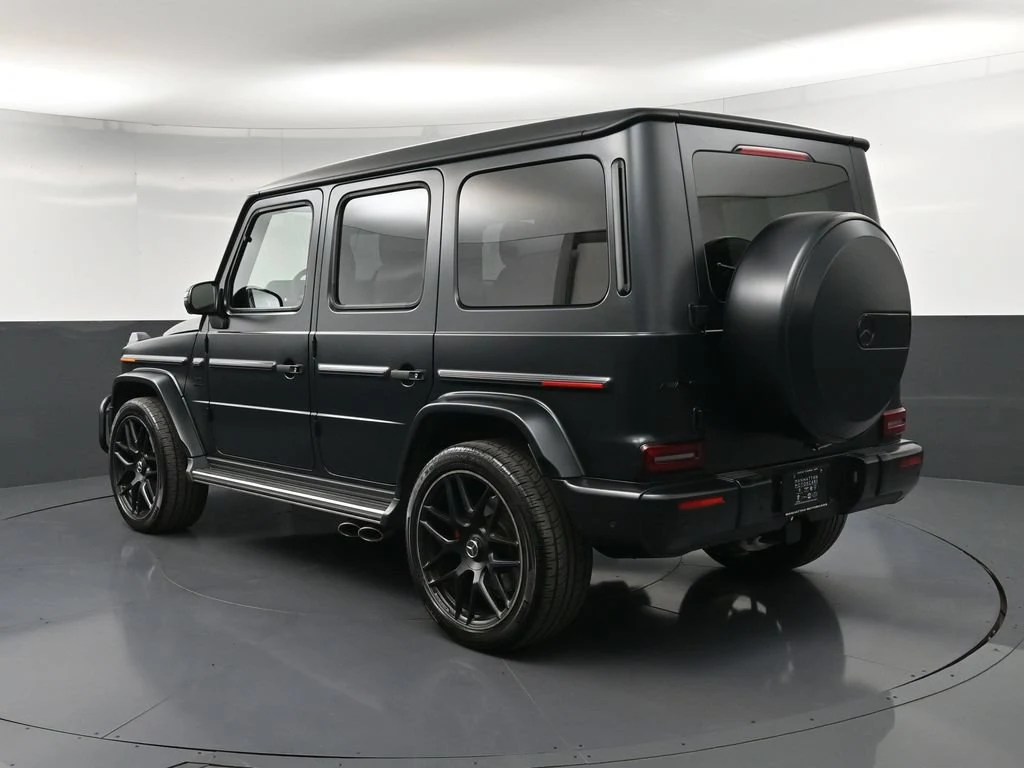 2023 Mercedes-AMG G 63, rear three-quarter view, Black