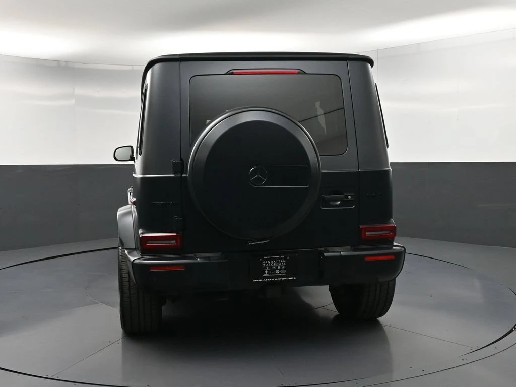 2023 Mercedes-AMG G 63, rear three-quarter view, Black
