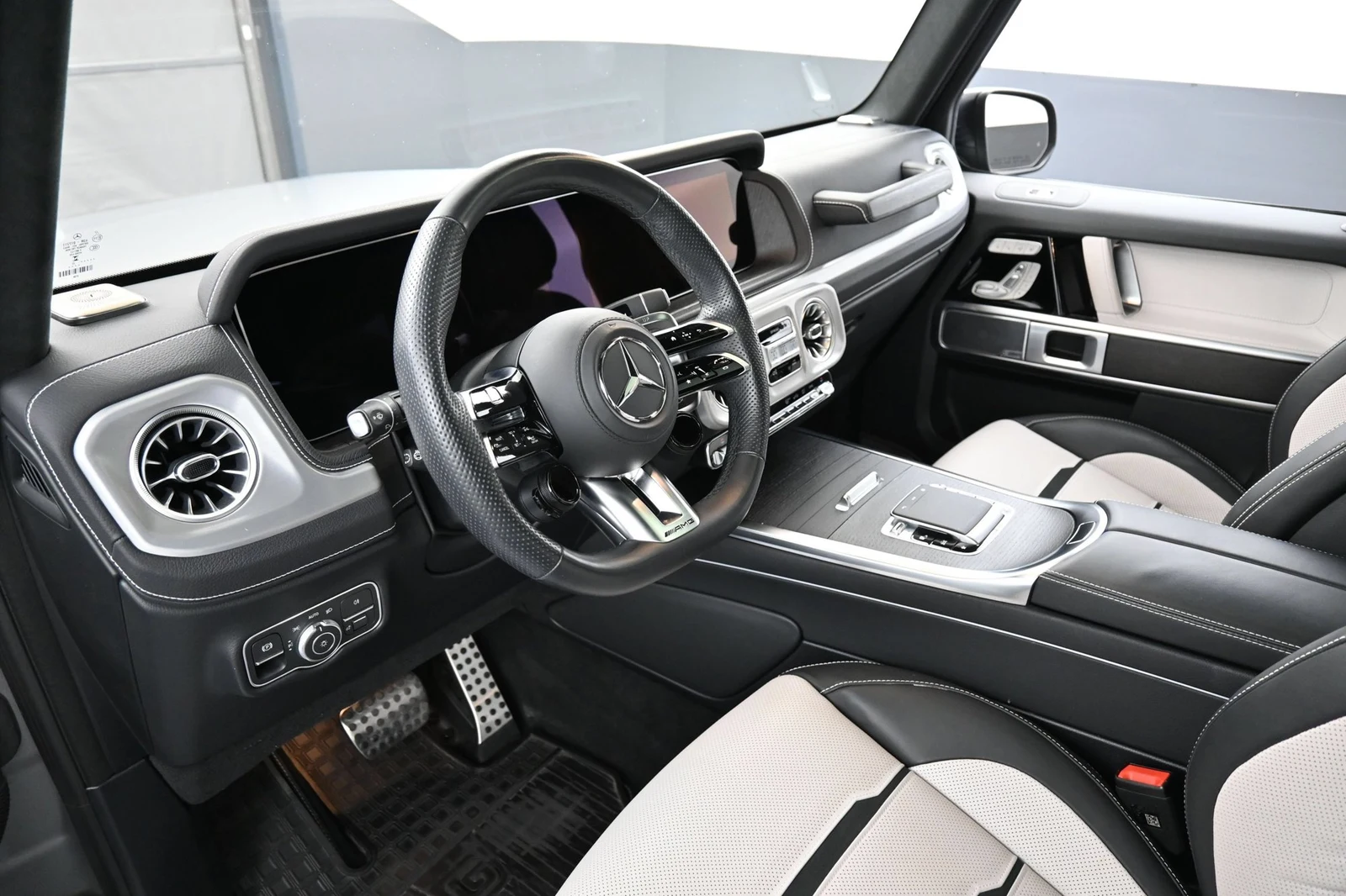 2025 Mercedes-AMG G 63 interior, dashboard, Platinum White/Black
