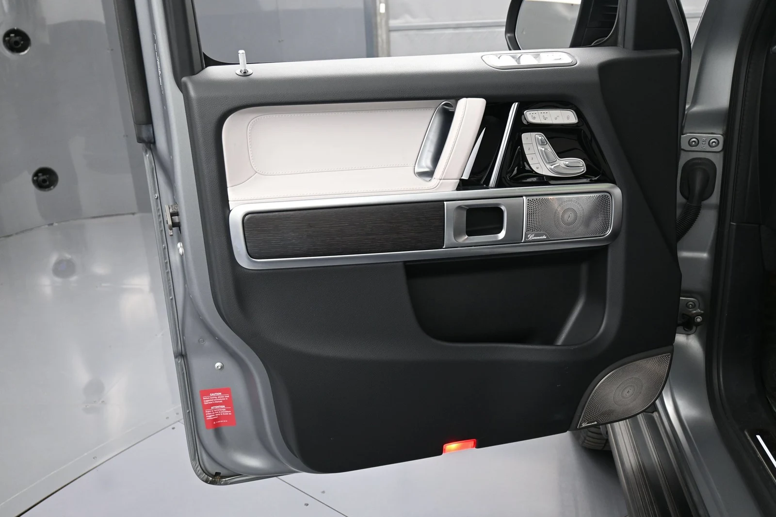 2025 Mercedes-AMG G 63 interior, door panel, Platinum White/Black