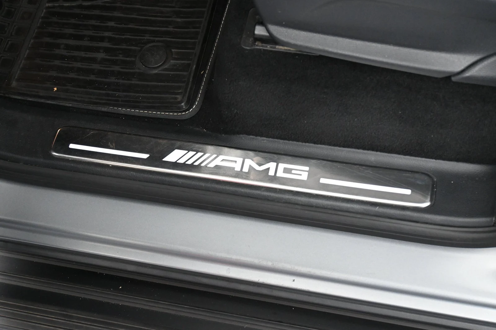 2025 Mercedes-AMG G 63 interior, door sill, Platinum White/Black