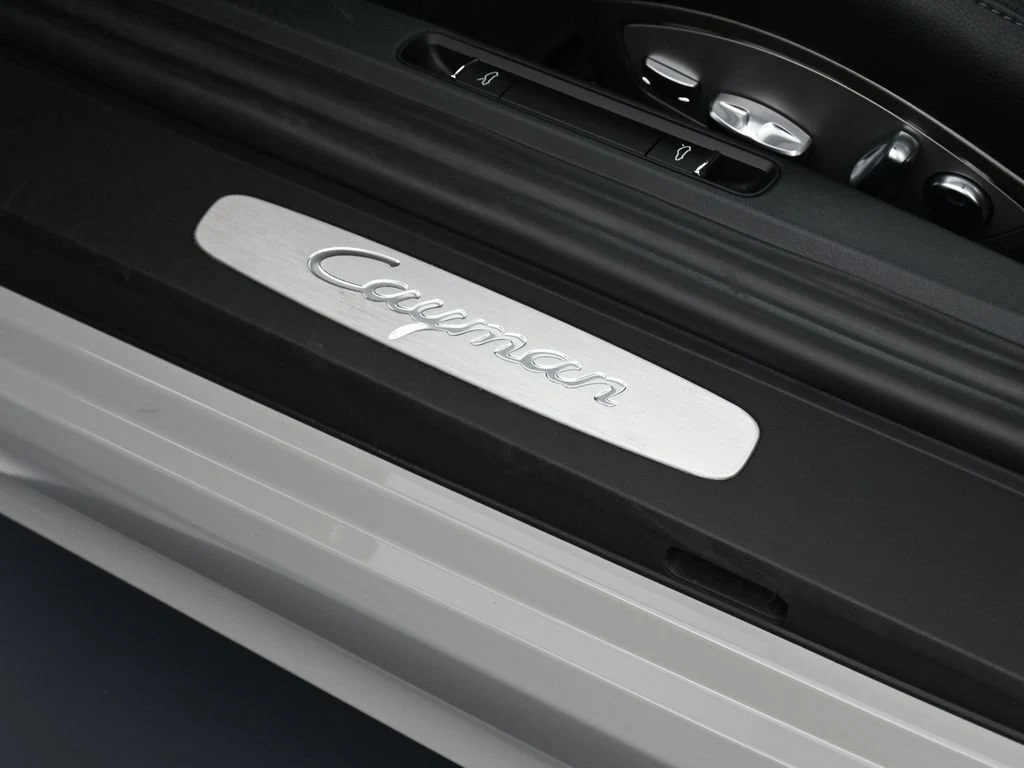 2024 Porsche 718 Cayman interior, door sill, Black