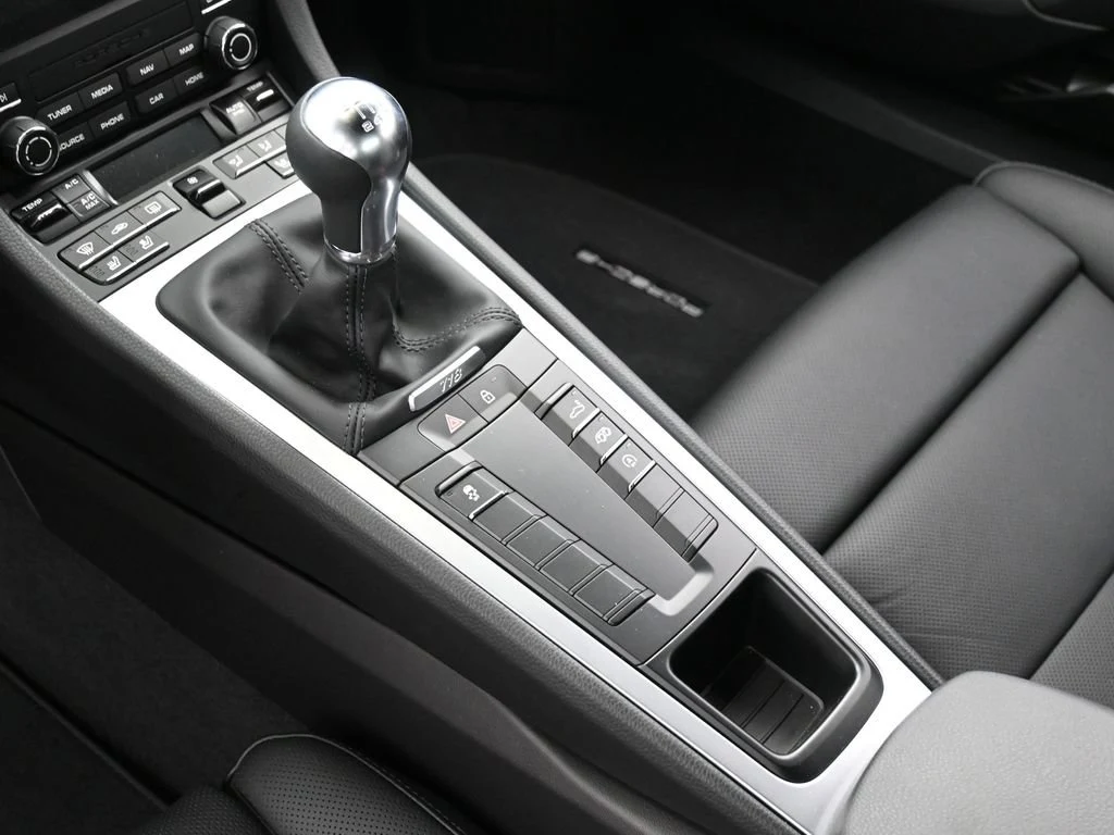 2024 Porsche 718 Cayman interior, center console, Black