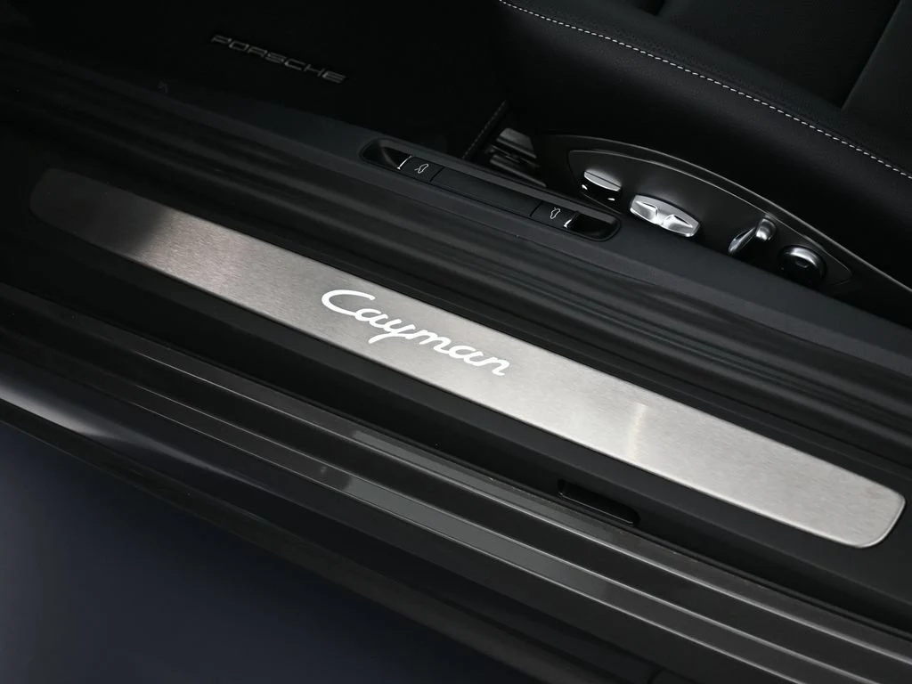 2025 Porsche 718 Cayman Style Edition interior, door sill, Black