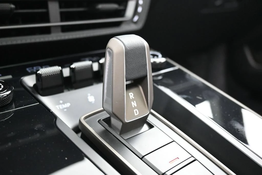 2025 Porsche 911 Turbo 50 Years interior, center console, Black with Tartan Fabric