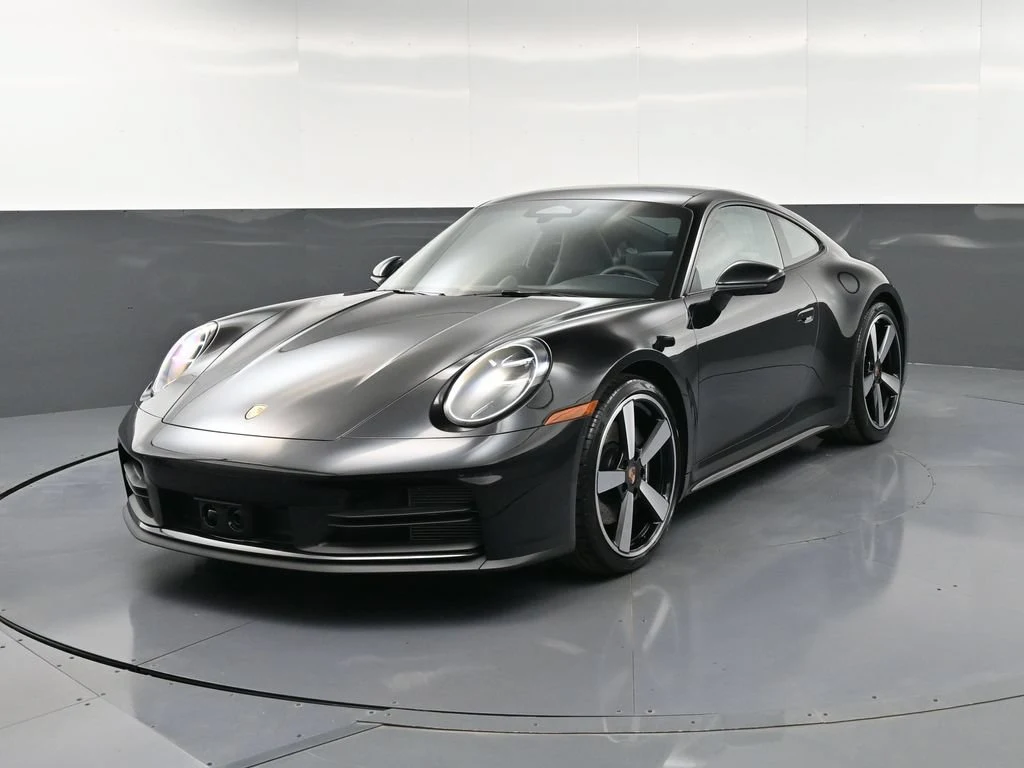 2026 Porsche 911 Carrera for sale, front three-quarter view, Black