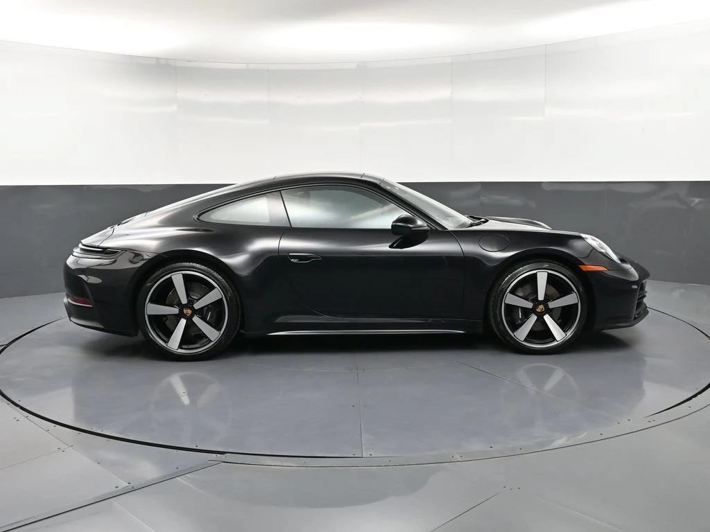 2026 Porsche 911 Carrera, side profile, Black