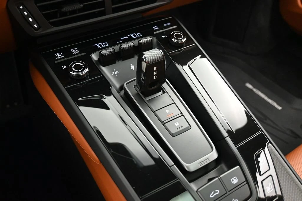 2026 Porsche 911 Carrera GTS interior, center console, Basalt Black/Classic Cognac