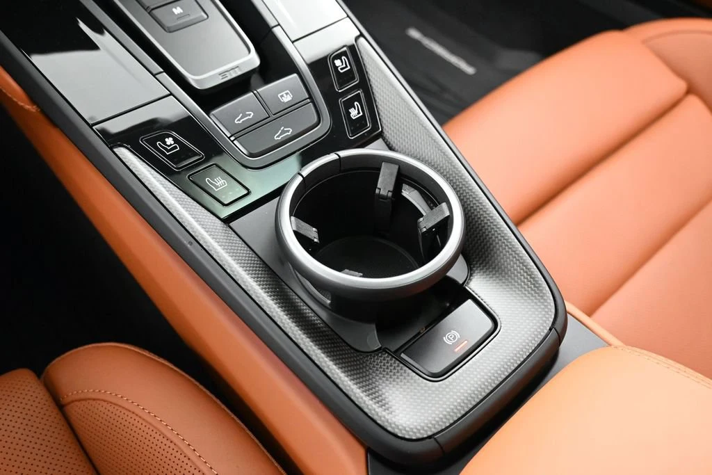 2026 Porsche 911 Carrera GTS interior, center console, Basalt Black/Classic Cognac
