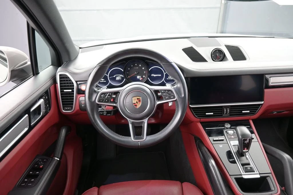 2023 Porsche Cayenne Platinum Edition interior, dashboard, Black/Bordeaux Red