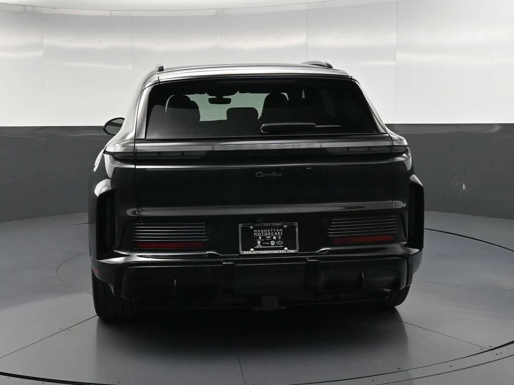 2026 Porsche Cayenne Turbo Electric, rear three-quarter view, Black