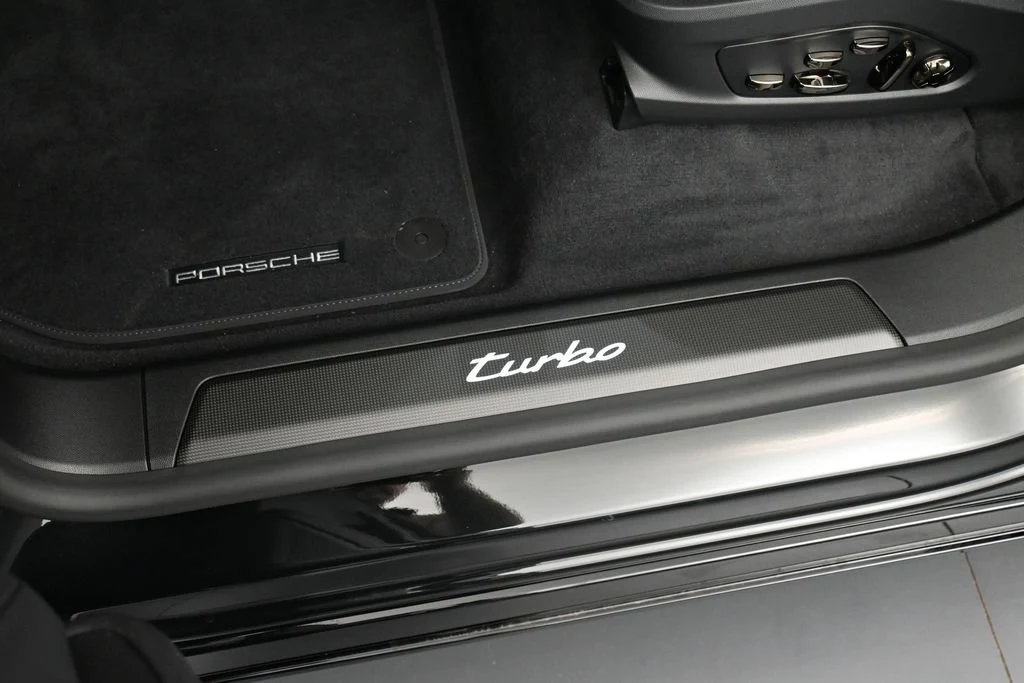 2026 Porsche Cayenne Turbo Electric interior, door sill, Black