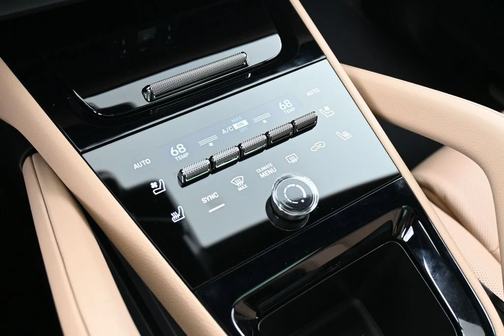 2026 Porsche Cayenne interior, center console, Black/Mojave Beige
