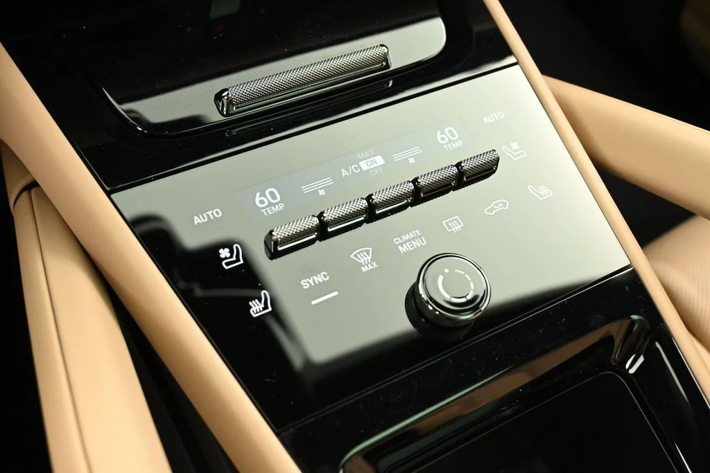 2026 Porsche Cayenne S Coupe interior, center console, Black/Mojave Beige