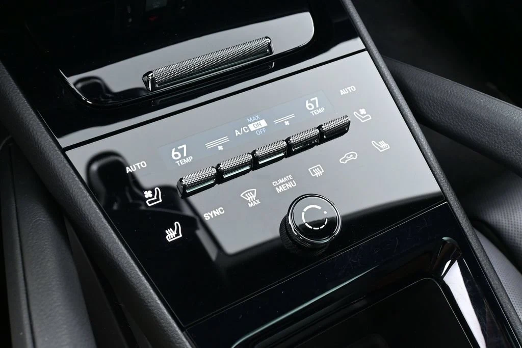 2025 Porsche Cayenne E-Hybrid Coupe interior, center console, Black