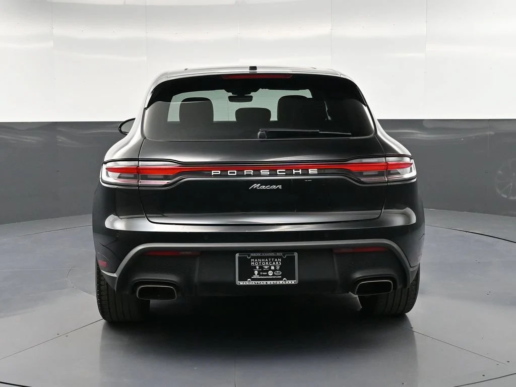 2023 Porsche Macan T, rear three-quarter view, Black