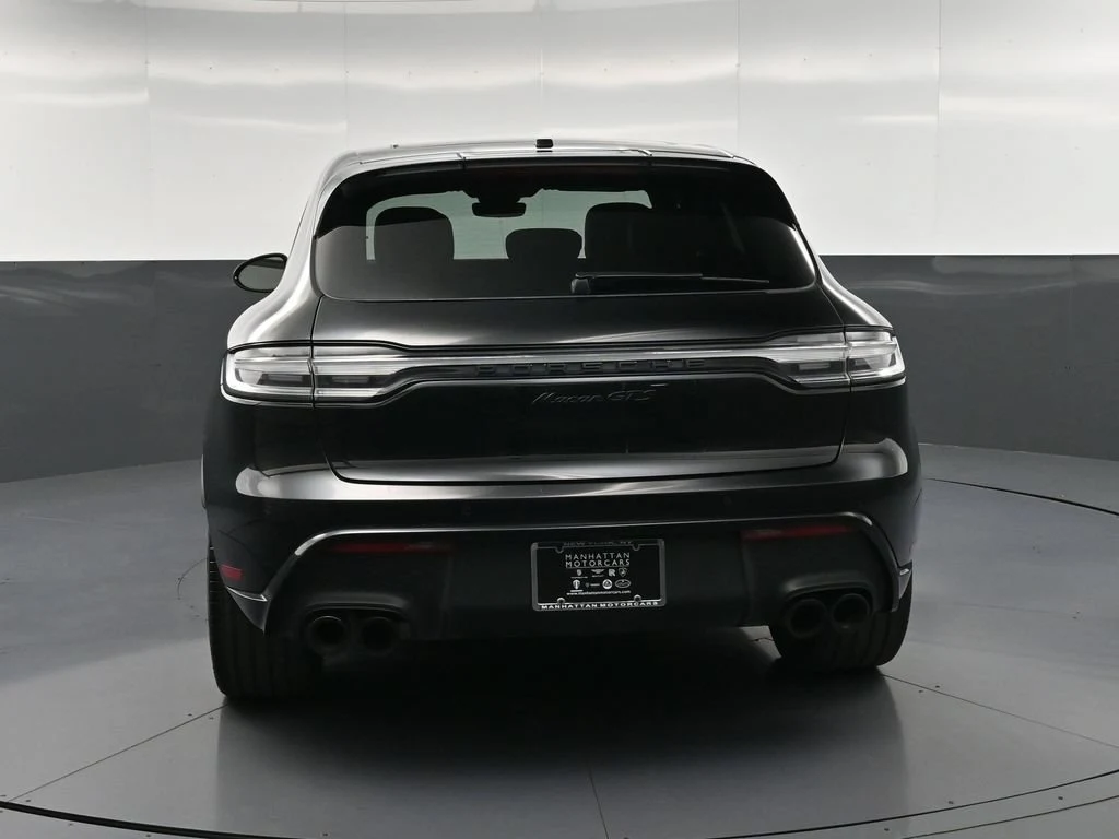 2023 Porsche Macan GTS, rear three-quarter view, Black