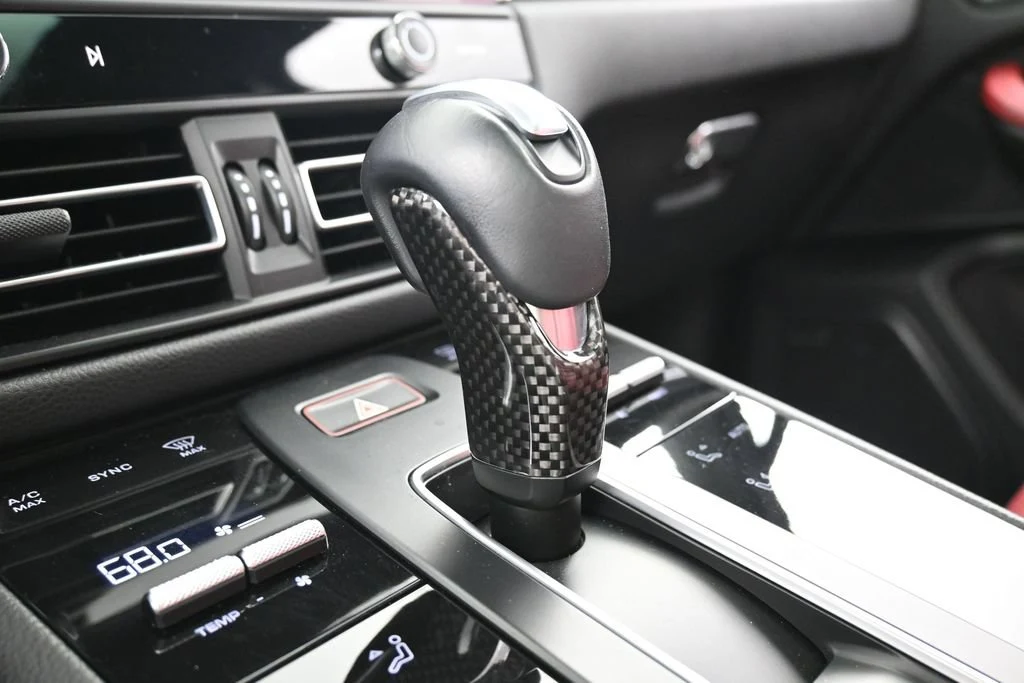 2023 Porsche Macan GTS interior, center console, Black/Bordeaux Red