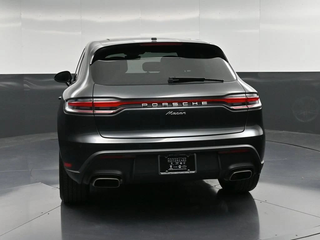 2025 Porsche Macan, rear three-quarter view, Grey
