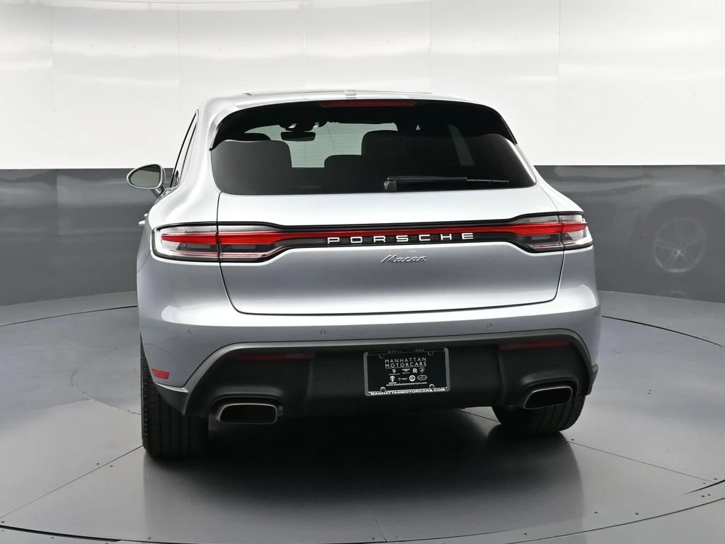 2025 Porsche Macan, rear three-quarter view, Silver
