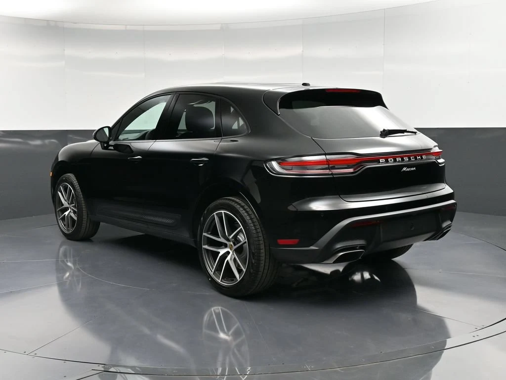 2026 Porsche Macan, rear three-quarter view, Black