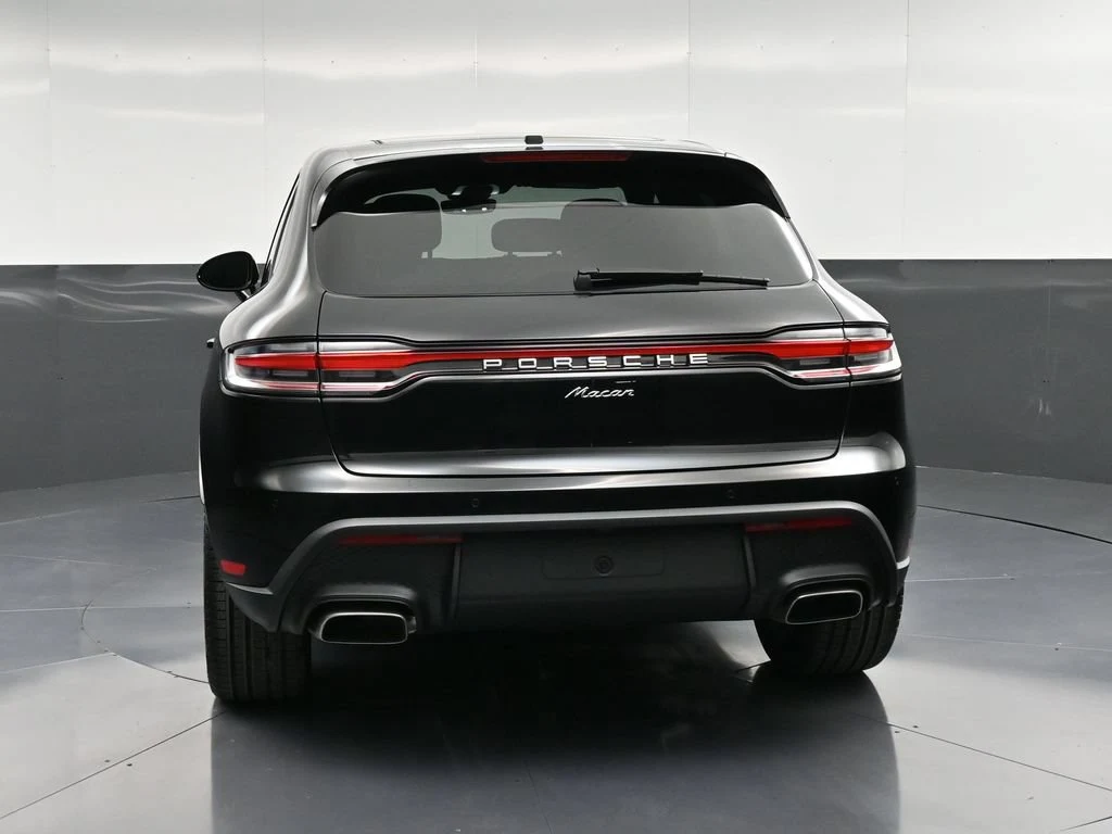 2026 Porsche Macan, rear three-quarter view, Black