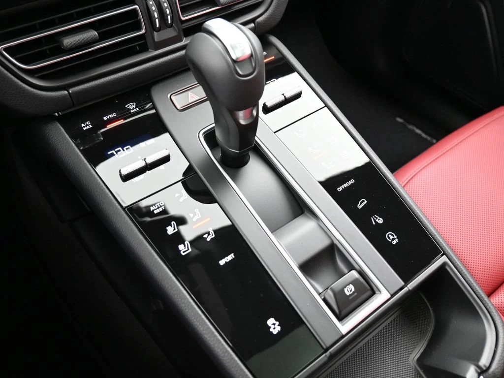 2026 Porsche Macan interior, center console, Black/Bordeaux Red
