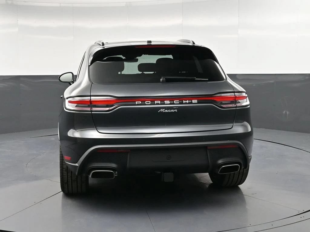 2026 Porsche Macan, rear three-quarter view, Grey