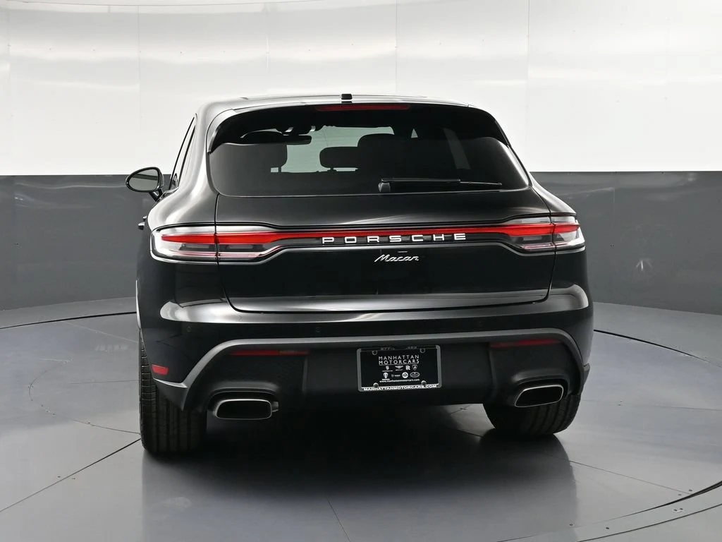 2026 Porsche Macan, rear three-quarter view, Black