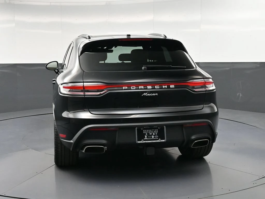 2026 Porsche Macan, rear three-quarter view, Black