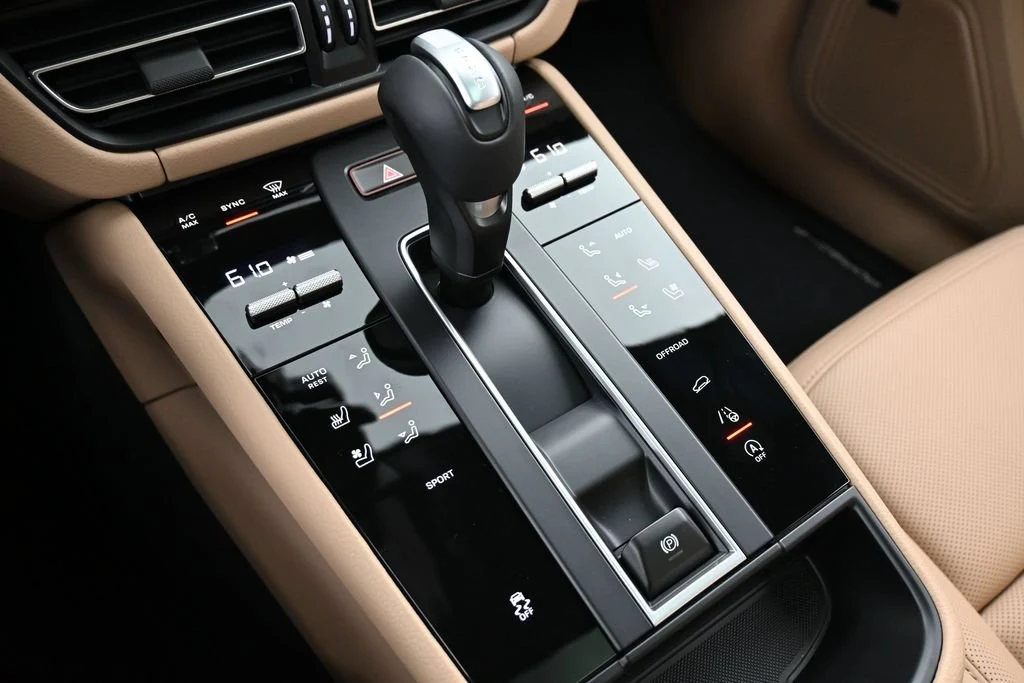 2026 Porsche Macan interior, center console, Black/Mojave Beige