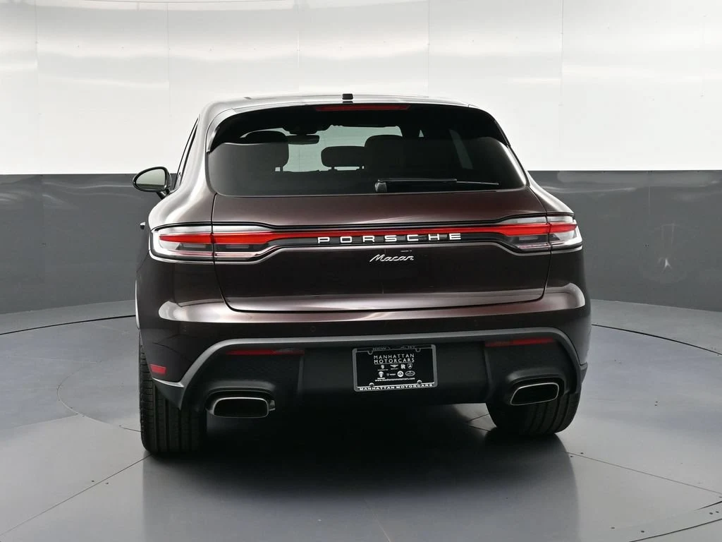 2026 Porsche Macan, rear three-quarter view, Red