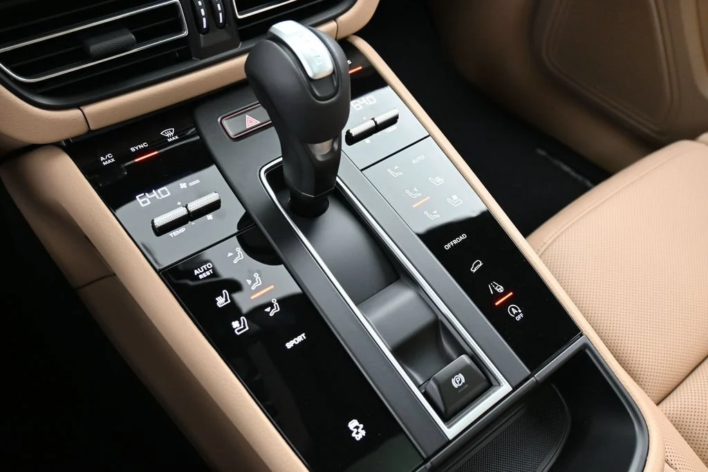 2026 Porsche Macan interior, center console, Black/Mojave Beige