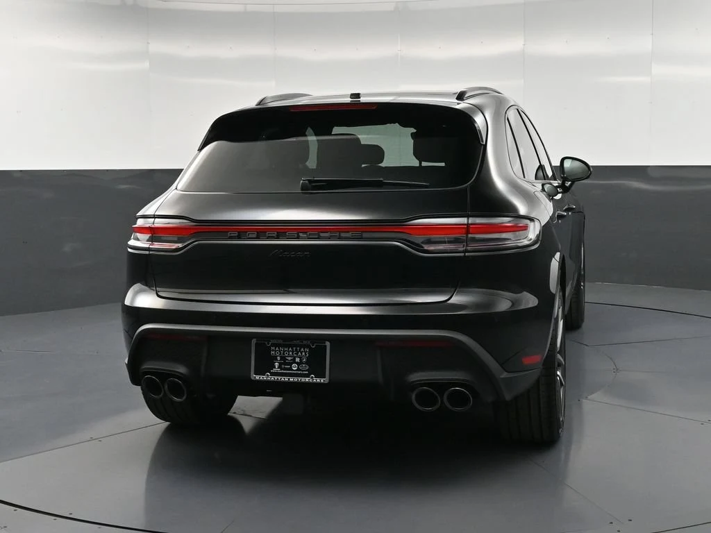 2026 Porsche Macan, rear three-quarter view, Black