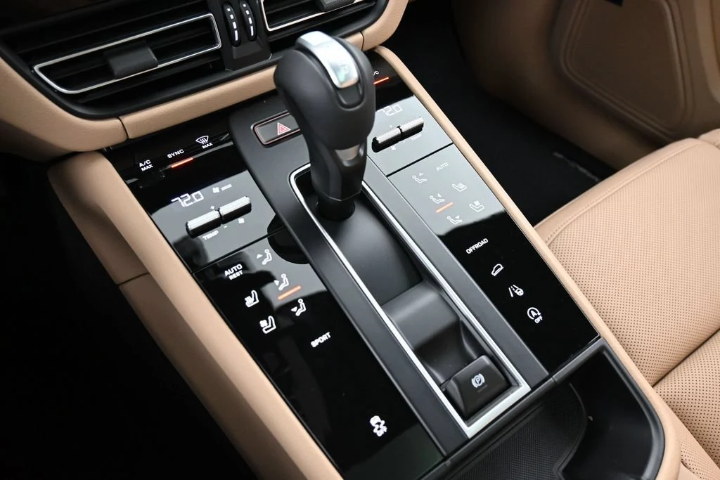 2026 Porsche Macan interior, center console, Black/Mojave Beige