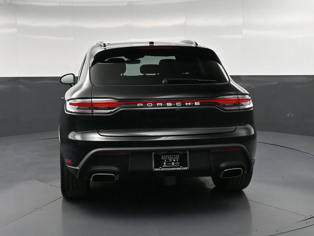 2026 Porsche Macan, rear three-quarter view, Black