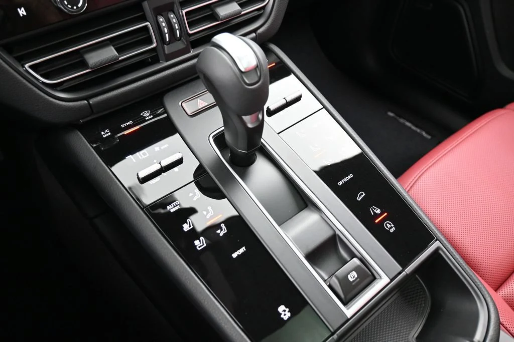 2026 Porsche Macan interior, center console, Black/Bordeaux Red